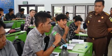 Aspidsus Kejati Sumut Dr Iwan Ginting SH MH  Kuliah Umum di FH USU dengan Topik KUHP Baru